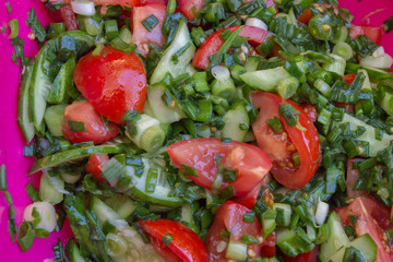 Chopped fresh vegetable salad of tomatoes, cucumbers, green onions