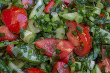 Chopped fresh vegetable salad of tomatoes, cucumbers, green onions