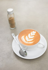 Hot coffee with sugar bottle.