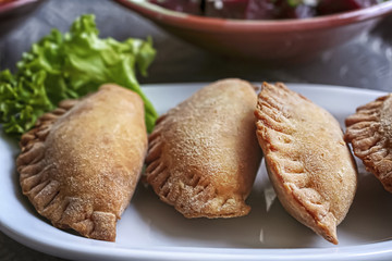 Homemade Stuffed Empanadas with lettuce