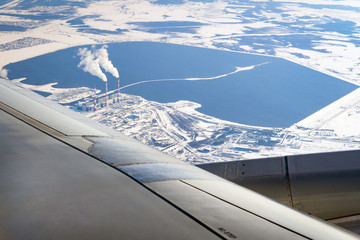 View of the Siberian city Surgut in winter from the aircraft