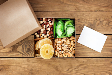 A box of nuts and dried fruits.