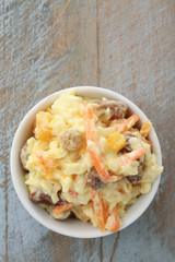 preparing coleslaw salad