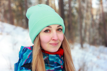 Winter portrait of a blonde girl