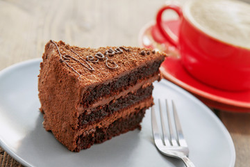 layered chocolate cake and coffee