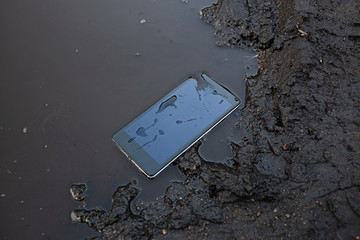 Smart phone in the mud