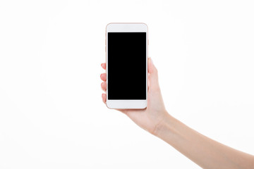Female right hand holding smartphone with blank screen on white background
