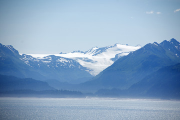 Fototapeta na wymiar Several volcanic peaks across Cook Inlet in Homer Alaska
