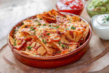 baked nacho chips with dips