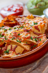 baked nacho chips with dips