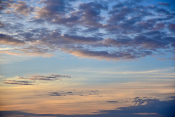 Naklejka na ściany i meble Cloudy sky during sunset