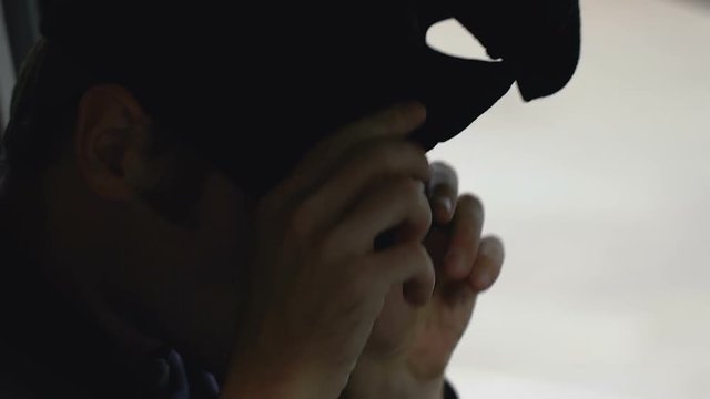Armed man in face mask going to commit crime, murder-for-hire, assassination