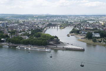 Fototapeta premium German Corner is a famous landmark where the Rhein and Mosel Rivers converge in the beautiful 2000 year old city of Koblenz, Germany, aerial view