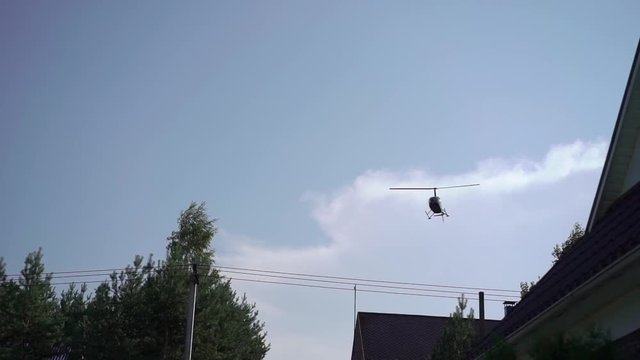 Helicopter flying in a sky slowmotion