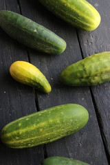 cucumbers on a old vintage table, harvest, food background