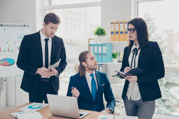 Three elegant classic business sharks, partners in suits having 