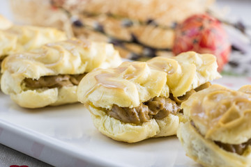 Detail on Easter sweet dessert with coffee cream on a white plate