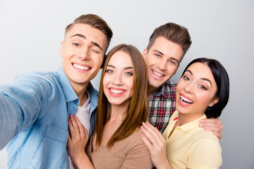 Portrait of carefree youth take selfie on the front camera of sm