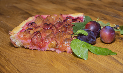 A piece of traditional German pie made from fresh plums.