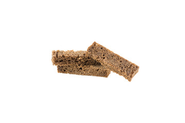 crackers sticks of dark bread isolated on white background