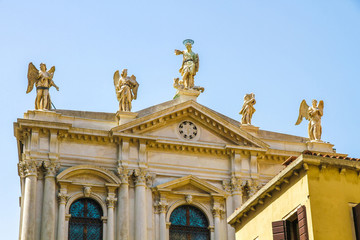 Fototapeta na wymiar View on a historic church in Venice, Italy on a sunny day.