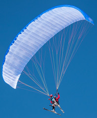 Skier paragliding in perfect conditions at the  alpe d'huez ski resort, France