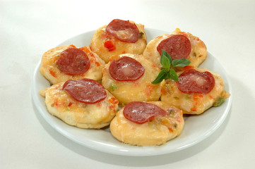 Small pizza with mozzarella cheese, sausage