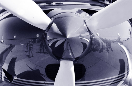 Aviation background. Propeller detail of a little airplane.