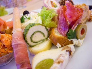 assorted appetizers on plate close up photo