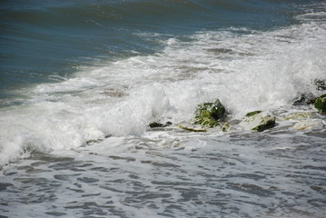 Waves on sea and stones