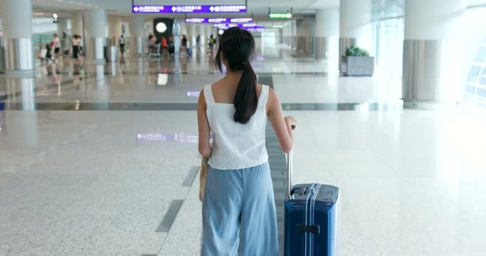 Woman walk in the airport