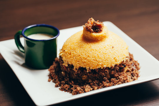 Cuscuz, corn couscous, is a Brazilian tipical food