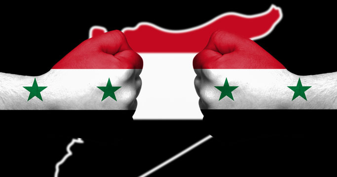 Flag of Syria painted on two clenched fists facing each other on black background with outline of Syria map/Syrian civil war concept