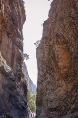 the narrowest hill in the mountain passage, on both sides there are steep mountain walls; the rock forms yellow-brown walls
