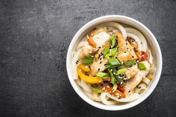 Udon stir-fry noodles with chicken and vegetables.