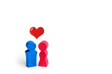 A man, a woman and a heart between them. The concept of love and sympathy between two people....