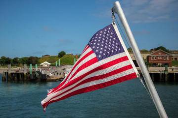 American flag waving from the hull