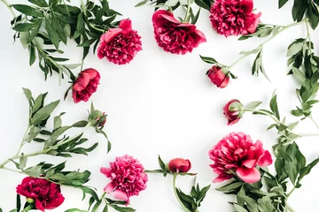 Fotobehang Tropische Bladeren Mock up of pink peony flowers with space for text. Flat lay, top view border frame.  © Floral Deco