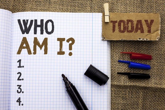 Text sign showing Who Am I Question. Conceptual photo Question Asked Identity Thinking Doubt Psycology Mystery written Notebook Book With Marker the jute background Today.