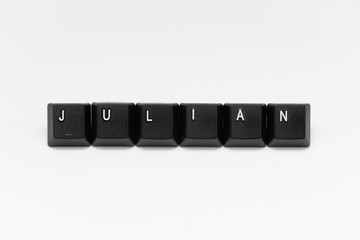 Black keys of keyboard with different years, words, names