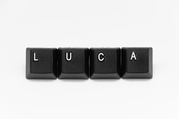 Black keys of keyboard with different years, words, names