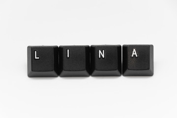Black keys of keyboard with different years, words, names