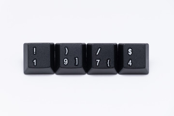 Black keys of keyboard with different years, words, names