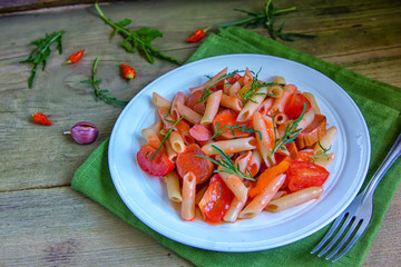 Penne pasta in tomato sauce.
