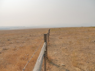 fence in smoky haze 