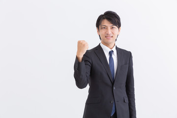 ミドル男性　ガッツポーズ　ビジネス