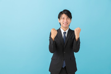 ミドル男性　ガッツポーズ　ビジネス