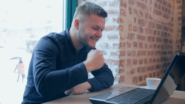 The happy man has fulfilled the task and has won, dances from the news