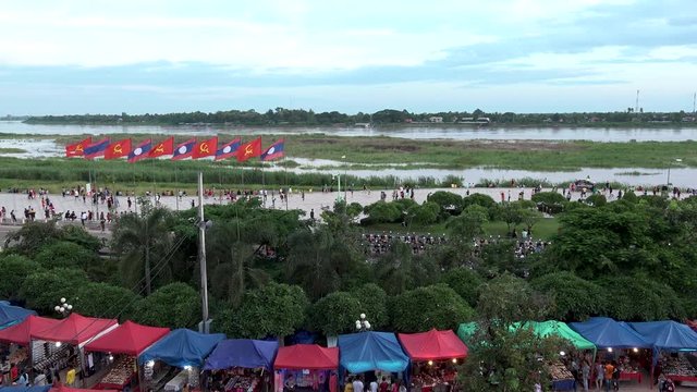 VIENTIANE,  LAOS - CIRCA AUGUST 2018 : Scenery of NIGHT MARKET and MEKONG RIVER.
