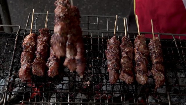 VIENTIANE,  LAOS - CIRCA AUGUST 2018 : Grilled BBQ PORK stick at BAN ANOU NIGHT MARKET.